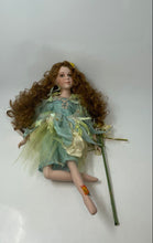 Load image into Gallery viewer, Brown Curly Hair Green Eyes Collectible Porcelain Doll In Multicolor Outfit

