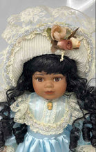 Load image into Gallery viewer, Chatelaine Collectible Fine Porcelain Doll Black Curly Hair And Brown Eyes
