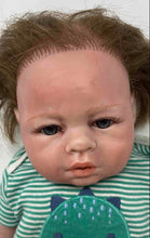 Load image into Gallery viewer, Brown Hair Realistic Baby Doll With White Green Striped Outfit
