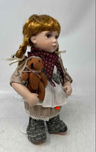 Load image into Gallery viewer, Duck House Heirloom Kassidy Girl Porcelain Doll Holding Brown Teddy Bear
