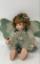 Load image into Gallery viewer, Brown Curly Hair Green Eyes Collector Play Doll In Green Dress And Angel Wings
