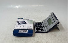 Load image into Gallery viewer, Curtoons World Time Travel Calendar Alarm Folding Device Calculator Untested
