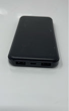 Load image into Gallery viewer, Lax Black Dual USB Portable Charger 12000mAh Power Bank Powers On
