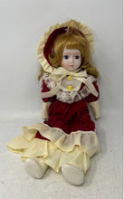 Load image into Gallery viewer, Red Dress Bonnet Lace Trim Yellow Buttons 16 Inch Collectible Porcelain Doll
