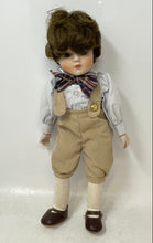 Load image into Gallery viewer, Brown Hair Blue Eyes Frederick Petticoat Boy Musical Porcelain Doll
