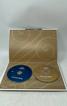 Load image into Gallery viewer, This Is Opera By. Verdi Hardcover Book DVD And CD Set 2 Pcs Spanish Version
