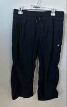 Load image into Gallery viewer, Lululemon Womens Black Pockets Drawstring Athletic Cropped Pants Size 10
