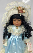 Load image into Gallery viewer, Chatelaine Collectible Fine Porcelain Doll Black Curly Hair And Brown Eyes
