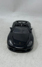 Load image into Gallery viewer, Jada Toys Porsche Carrera GT Black Collectible Open Doors Diecast Car Toy
