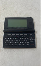 Load image into Gallery viewer, Franklin Merriam-Webster BES-2170 Handheld Electronic Language Translator
