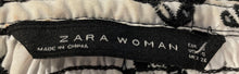 Load image into Gallery viewer, Zara Womens Black White Floral Embroidered Smocked Side Zip Mini Skirt Size S

