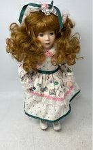 Load image into Gallery viewer, Vintage Curly Brown Hair And Blue Eyes Collectible Porcelain Doll In White Dress
