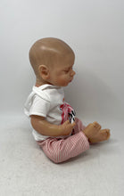 Load image into Gallery viewer, Reborn Closed Eyes White Graphic T-Shirt And Pink Striped Pants Vinyl Doll
