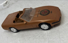 Load image into Gallery viewer, National Corvette Museum Labor Day Weekend 1994 Brown Plastic Toy Car
