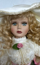 Load image into Gallery viewer, White Lace Dress Pink Ribbon Hat Curly Blonde Hair Collectible Porcelain Doll
