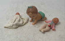 Load image into Gallery viewer, Tomy Hard Plastic Wind-Up Crawling Baby Toy With Two Small Dolls 3 Pieces
