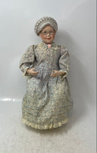 Load image into Gallery viewer, 1991 Sitting Grandmother Decorative Porcelain Doll With Stool And Floral Outfit
