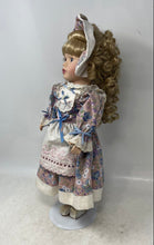 Load image into Gallery viewer, Blonde Curly Hair Blue Eyes Porcelain Doll With Multicolor Floral Outfit
