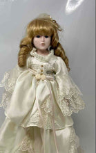 Load image into Gallery viewer, Blonde Curly Hair Blue Eyes Collectible Porcelain Doll In Off-White Maxi Dress
