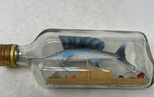 Load image into Gallery viewer, Home Decorative Piece Consists Of A Replica Of A Sailfish Inside A Glass Bottle
