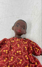 Load image into Gallery viewer, Vintage Hard Plastic Play Doll Featuring A Red Yellow Dress With Floral Pattern
