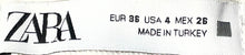 Load image into Gallery viewer, Zara Womens White Denim 5-Pockets Flat Front Distressed Cut-Off Shorts Size 4
