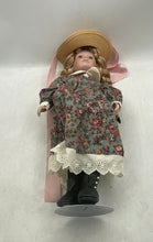 Load image into Gallery viewer, Brinn's Collector Porcelain Doll In Floral Outfit Dress Brown Hair And Hat
