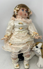 Load image into Gallery viewer, Blonde Hair Blue Eyes Porcelain Doll With Puppy Nipping At Dress Skirt
