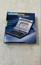 Load image into Gallery viewer, Curtoons World Time Travel Calendar Alarm Folding Device Calculator Untested
