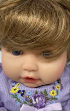 Load image into Gallery viewer, Paradise Galleries Brown Hair Blue Eyes Floral Outfit Sitting Reborn Baby Doll
