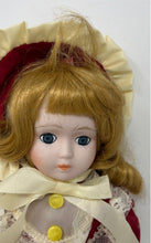 Load image into Gallery viewer, Red Dress Bonnet Lace Trim Yellow Buttons 16 Inch Collectible Porcelain Doll
