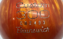 Load image into Gallery viewer, Vintage Brunswick Custom 300 Orange Swirl Sports Equipment Drilled Bowling Ball
