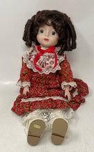 Load image into Gallery viewer, Dark Brown Curly Hair Blue Eyes Porcelain Girl Doll In Multicolor Maxi Dress
