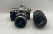 Load image into Gallery viewer, Minolta Maxxum 4 Silver Black DSLR Film Camera In Case And Extra Lens Untested

