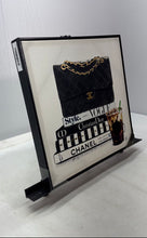 Load image into Gallery viewer, Chanel Bag Resting On Stack Of Fashion Books Iced Coffee Framed Canvas Art Print
