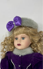 Load image into Gallery viewer, Blonde Curly Hair Blue Eyes Collectible Porcelain Doll With Purple Outfit
