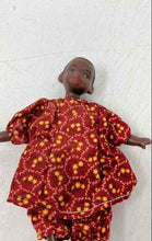 Load image into Gallery viewer, Vintage Hard Plastic Play Doll Featuring A Red Yellow Dress With Floral Pattern
