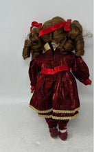 Load image into Gallery viewer, Collectors Choice Brown Hair Collectible Porcelain Doll In Red &amp; Gold Outfit
