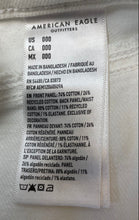 Load image into Gallery viewer, American Eagle Outfitters Womens White Strigid Light Wash Jean Shorts Size 00
