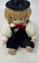 Load image into Gallery viewer, Blonde Hair Green Eyes Red Bow Decorative Porcelain Baby Doll With Black Hat
