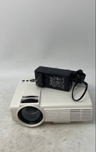 Load image into Gallery viewer, RCA RPJ116 White Portable Home Projector With Power Adapter Not Tested
