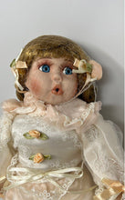 Load image into Gallery viewer, Blonde Hair Blue Eyes Porcelain Doll With Puppy Nipping At Dress Skirt

