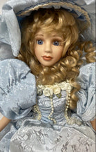 Load image into Gallery viewer, Blue Victorian Dress Blonde Curly Hair Lace Hat Light Complexion Porcelain Doll
