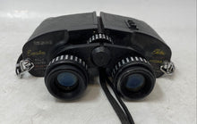 Load image into Gallery viewer, Vintage Tasco Executive Model 108 Black 7x-15x35 Electric Zoom Binoculars w/Case
