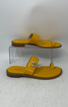 Load image into Gallery viewer, Michael Kors Womens Mustard Slip-On Flat Thong Sandals Size 7.5M
