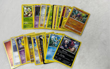 Load image into Gallery viewer, Lot Of Assorted Mixed Variety Collectible Pokémon Trading Card Game In Tin Box
