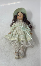 Load image into Gallery viewer, Vintage Brown Hair Collectible Mini Bisque Porcelain Doll With Green Outfit
