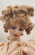 Load image into Gallery viewer, Blonde Hair Blue Eyes Decorative Porcelain Doll In Pink Maxi Dress w/ Stand

