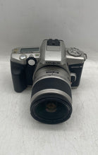 Load image into Gallery viewer, Minolta Maxxum 4 Silver Black DSLR Film Camera In Case And Extra Lens Untested
