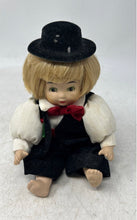 Load image into Gallery viewer, Blonde Hair Green Eyes Red Bow Decorative Porcelain Baby Doll With Black Hat
